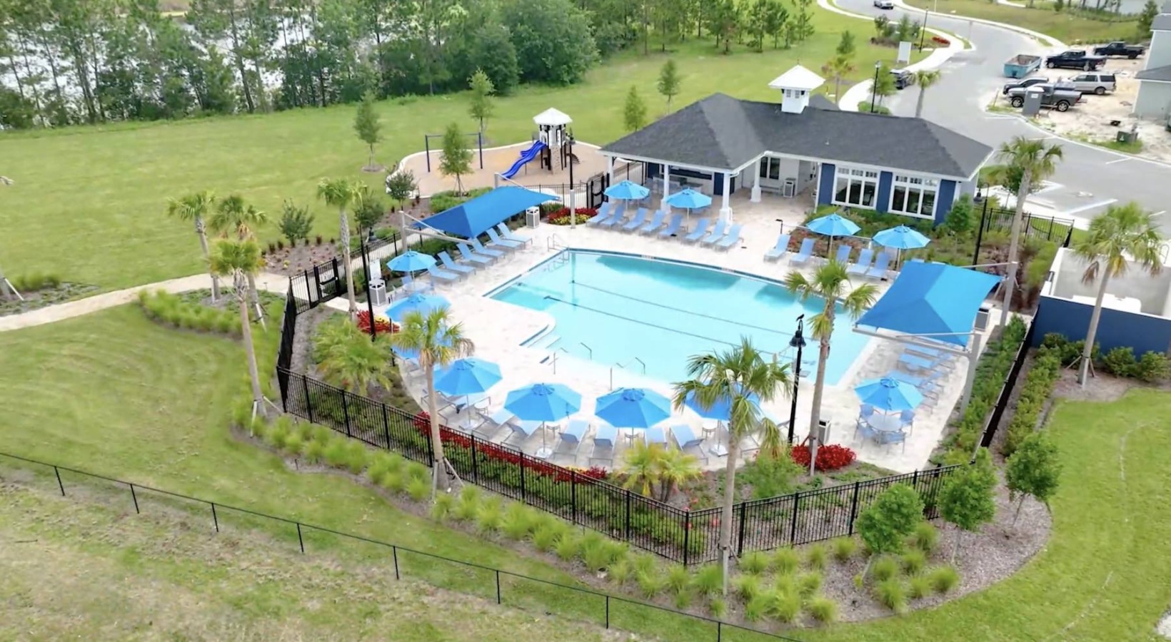 an aerial view of a courtyard with a swimming pool